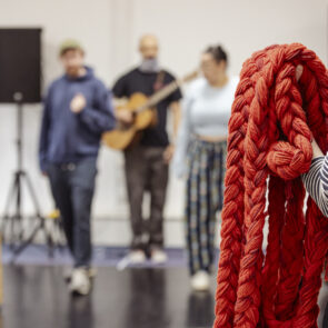 Long red hair, made of rope.
