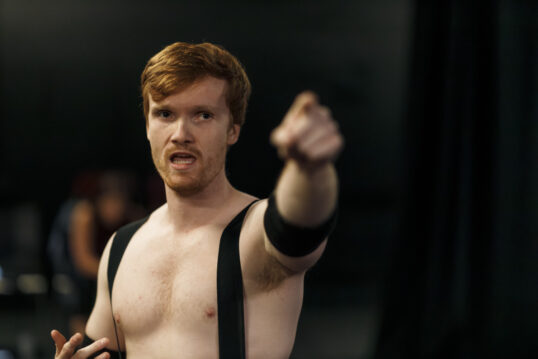 Casey Lloyd in character as Brad Habits for WWG: GURTmania